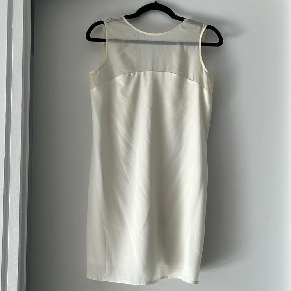White mini sheath dresss with mesh top and low back